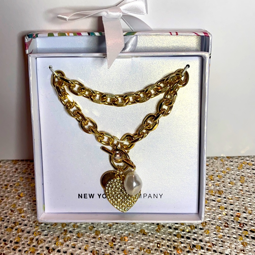 Gold Bracelet With Three Charms
